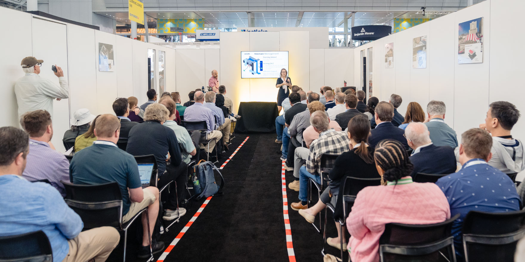 Attendees at the CE theater at AIA conference
